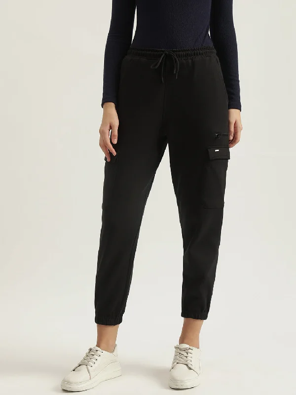 Hurry! While Supplies Last!Hurry! While Supplies Last!Elle Women Black Solid Relaxed Fit Mid-Rise Joggers Style Trouser Hurry! While Supplies Last!Hurry! While Supplies Last!Elle Women Black Solid Relaxed Fit Mid-Rise Joggers Style Trouser
